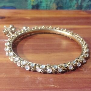 Elegant Gold and Pearl Bangle